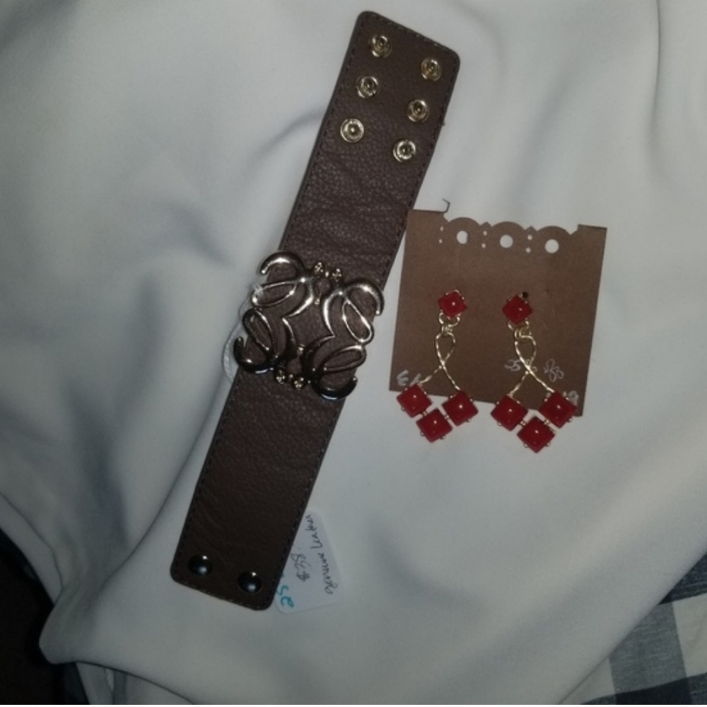 Genuine leather.cuff and jewel tone earrings